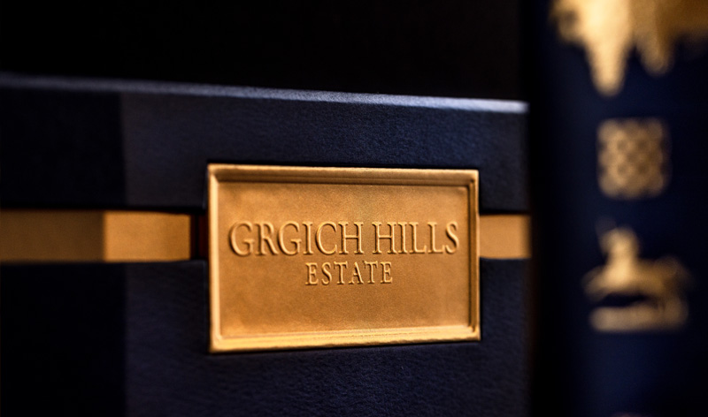 A golden, embossed label on a box of Paradise Block Cabernet Sauvignon wines.