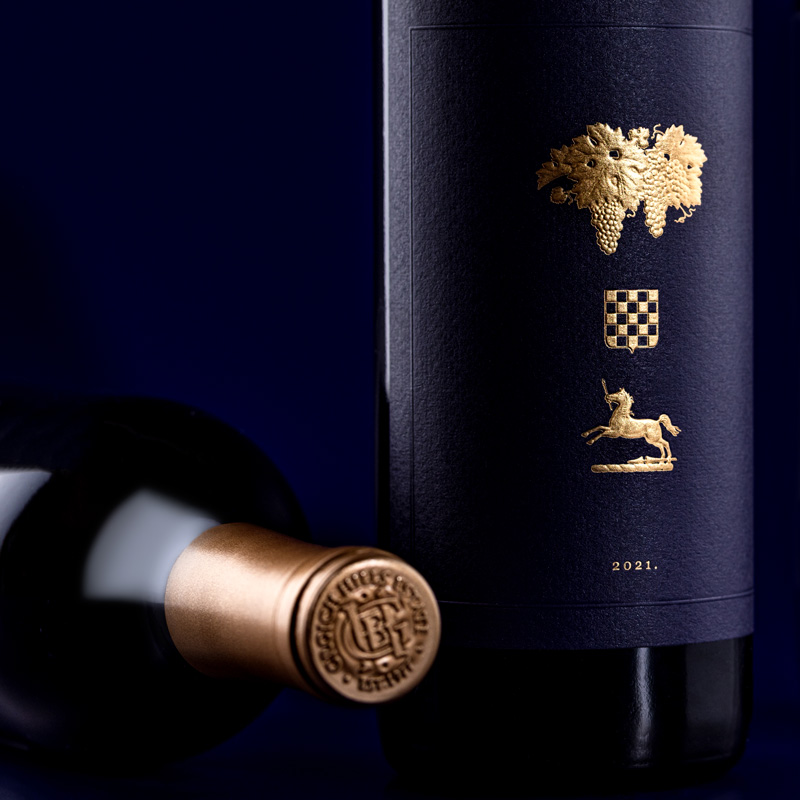 A close-up of the label and the foil capsule of Grgich Hills Estate's 2021 Paradise Block Old Vine Cabernet Sauvignon.