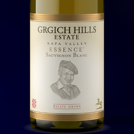 Label of Grgich Hills Estate Sauvignon Blanc, Napa Valley Essence, set in front of a royal blue background.