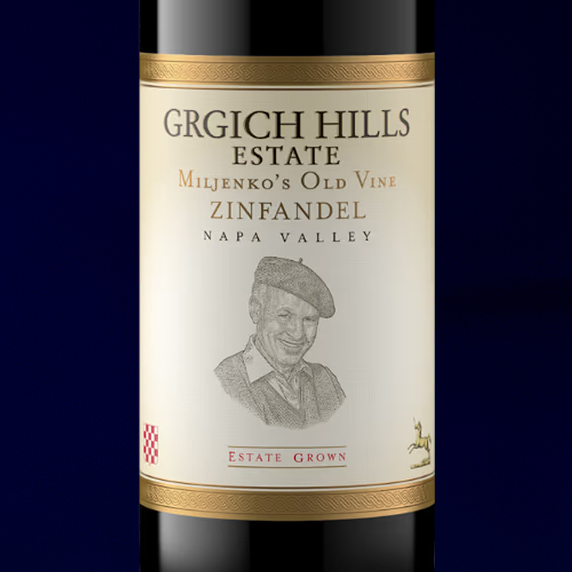 Label of Grgich Hills Estate Miljenko's Old Vine Zinfandel, estate grown in Napa Valley, set in front of a royal blue background.
